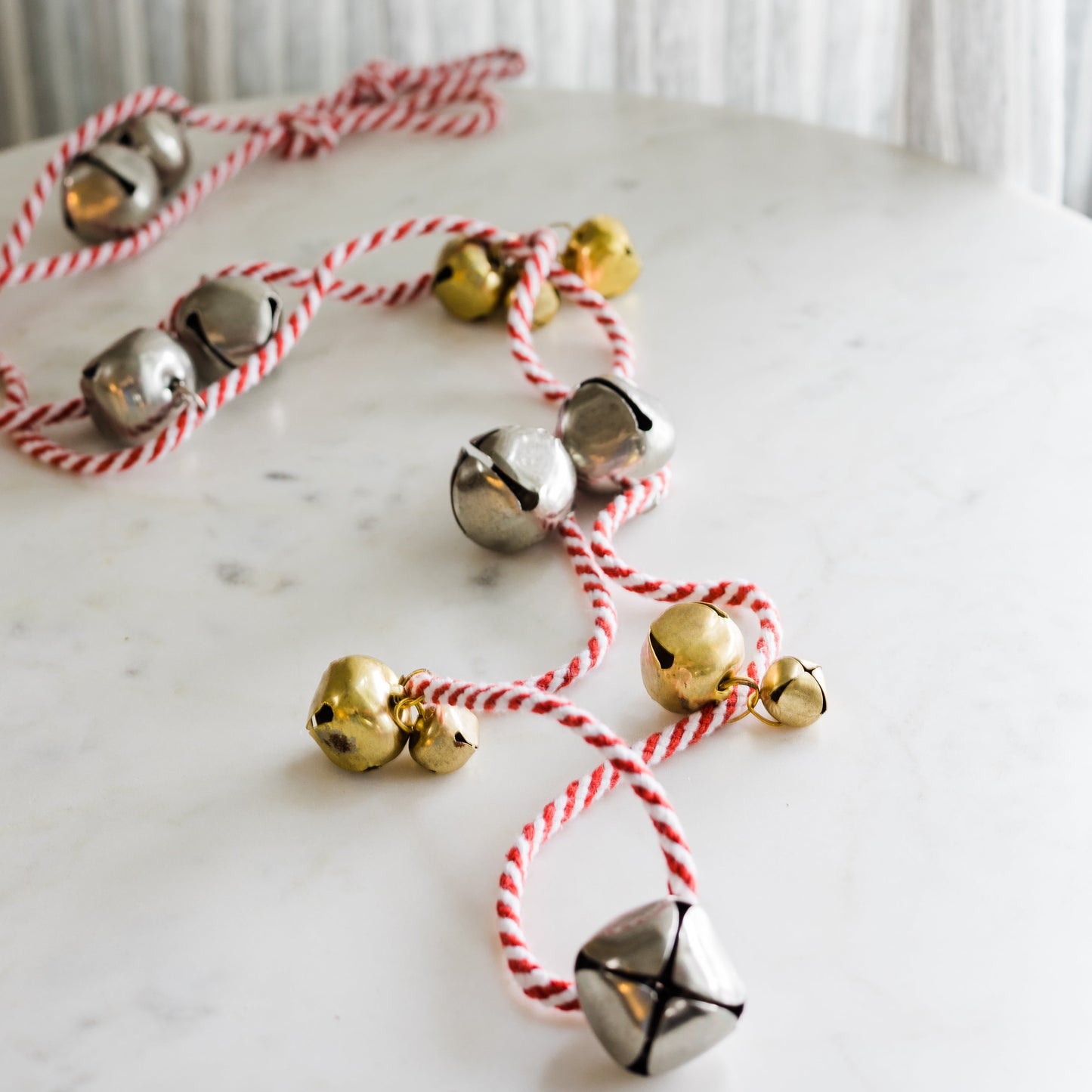 Metal Bell Garland w/ Red & White Cord, Silver & Gold Finish